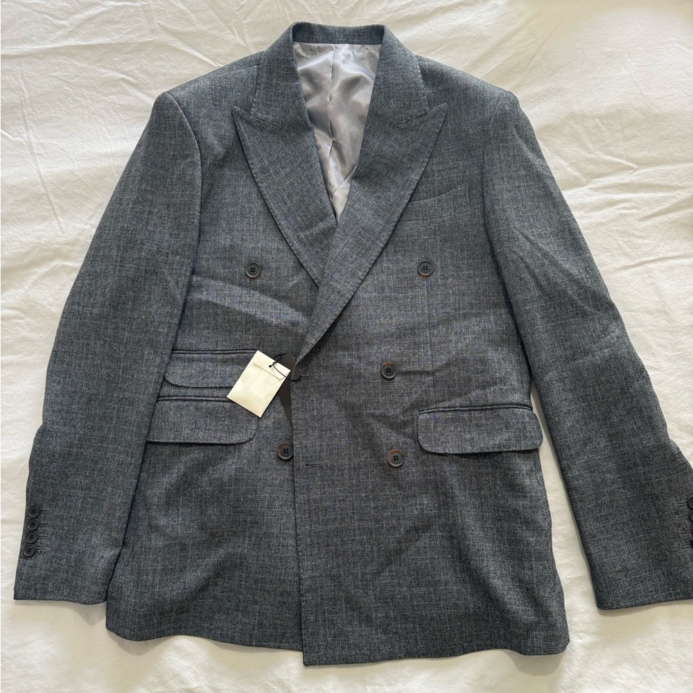 Men’s suit jacket. Brand new. Must go.